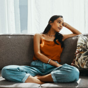 disappointed woman on couch